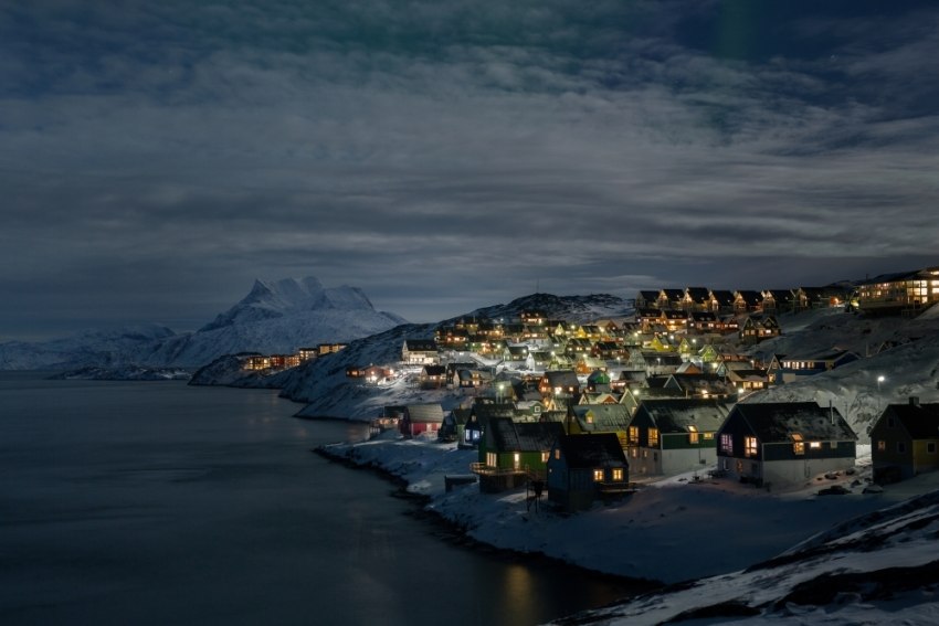 The Green Land where the sun does not set and the sky shines with electric hues